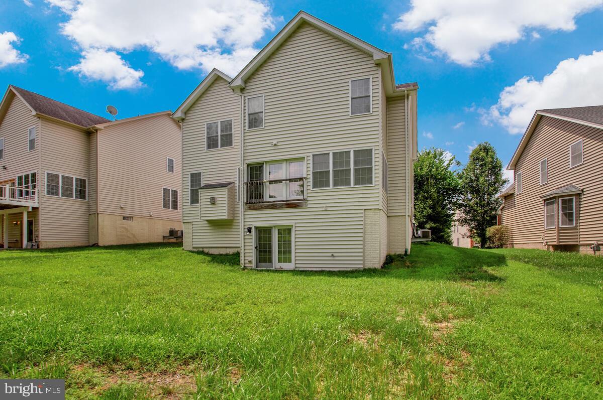 4006 Bridle Ridge Road Upper Marlboro, MD 20772 - Photo 44 of 45 a view of a house with backyard