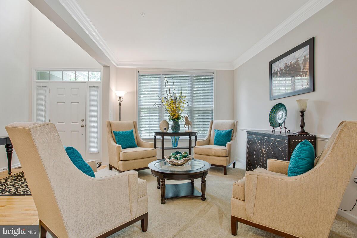 4006 Bridle Ridge Road Upper Marlboro, MD 20772 - Photo 8 of 45 a living room with furniture and a large window