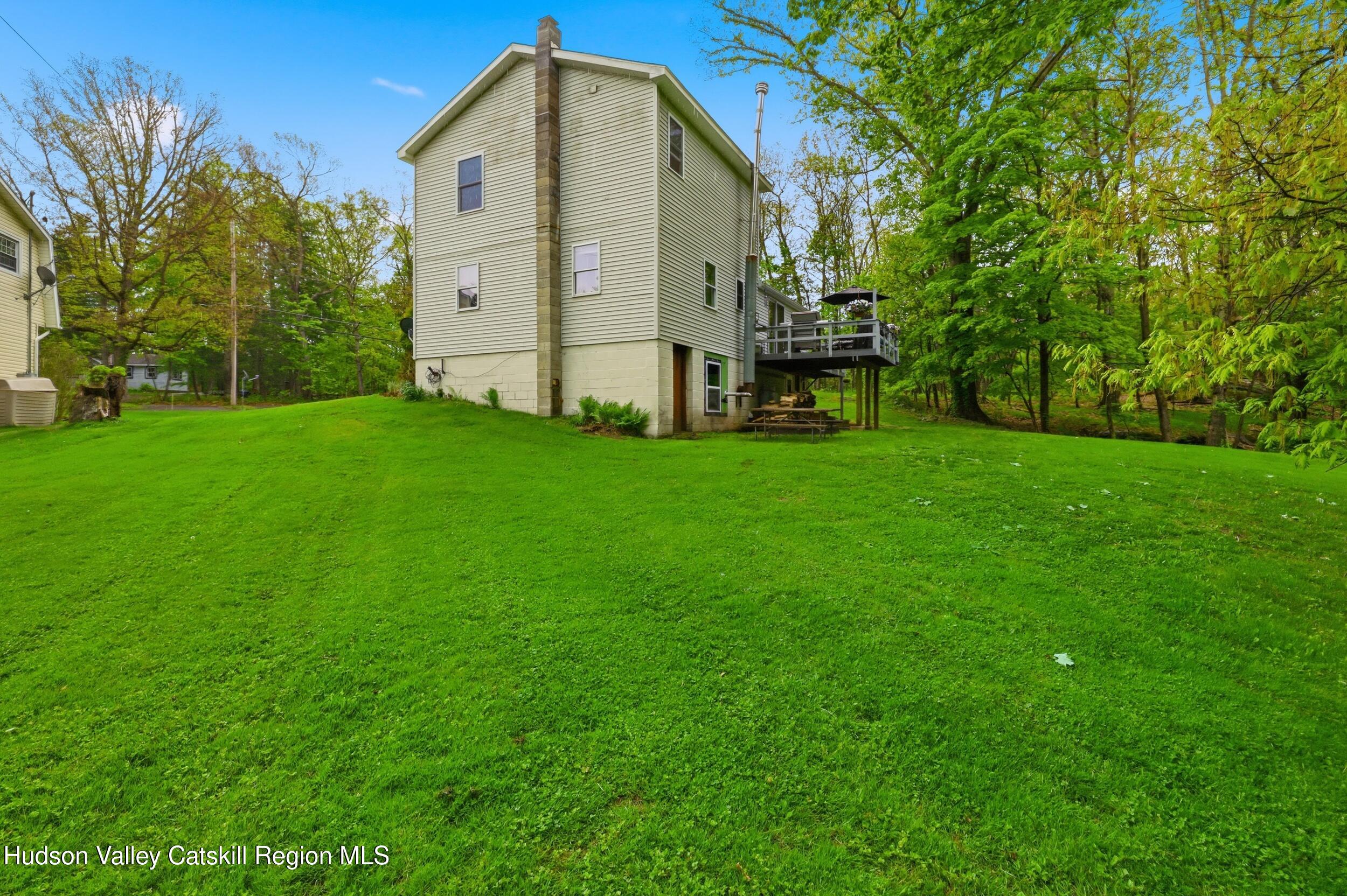 186 Cedar Hill Road High Falls, NY 12440 - Photo 32 of 33 a front view of a house with garden