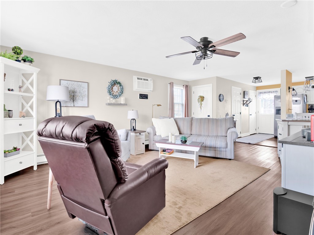 1175 Diamond Hill Road, Unit 305 Woonsocket, RI 02895 - Photo 6 of 27 Living room - looking towards kitchen with rear door to deck