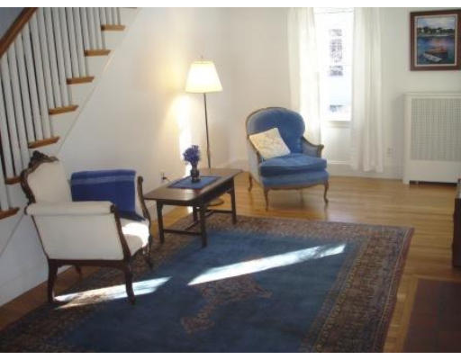 45 Elmwood Road Wellesley, MA 02481 - Photo 2 of 6 a living room with furniture a lamp and a window