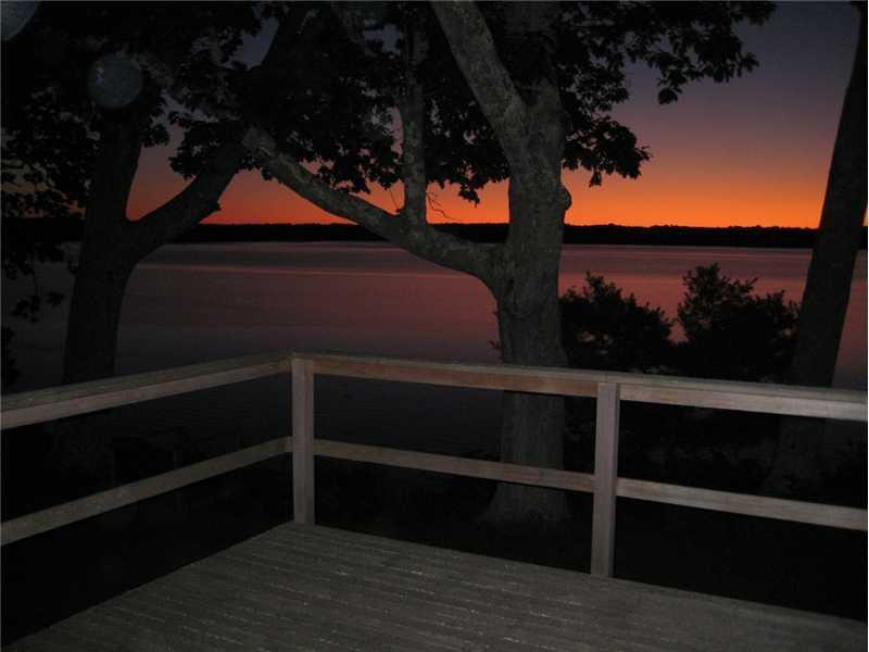 1108 Dutch Neck Road Waldoboro, ME 04572 - Photo 9 of 31 Patio/Deck. Deck view at sunset