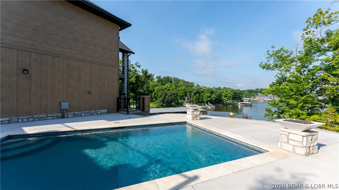 844 Thrush Road Lake Ozark, MO 65049 - Photo 51 of 68 Lakeside pool with gas fire bowls