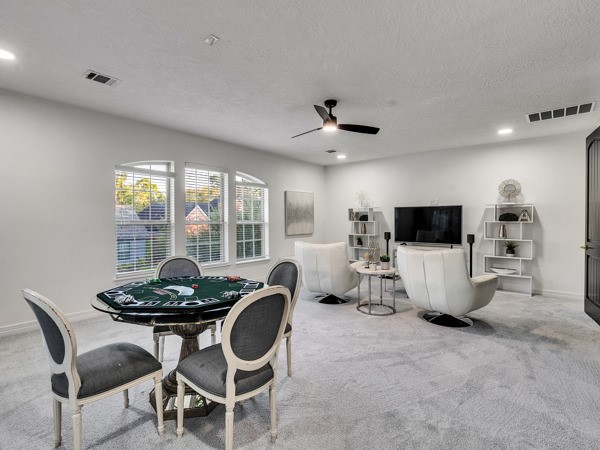 2523 Watts Street Houston, TX 77030 - Photo 34 of 45 a living room with furniture and a flat screen tv
