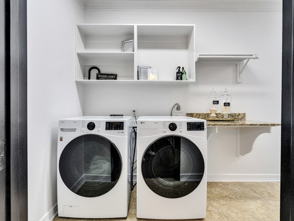 2523 Watts Street Houston, TX 77030 - Photo 41 of 45 a utility room with dryer and washer