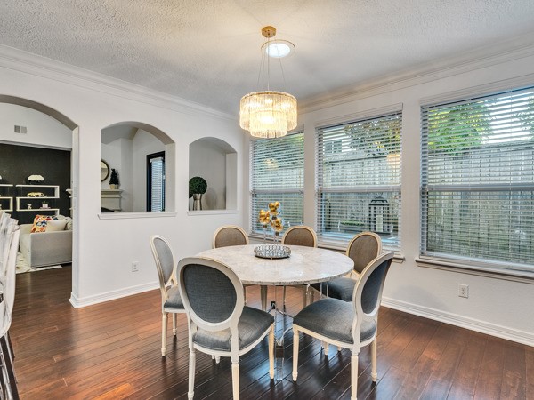 2523 Watts Street Houston, TX 77030 - Photo 9 of 45 a view of a dining room with furniture window and wooden floor