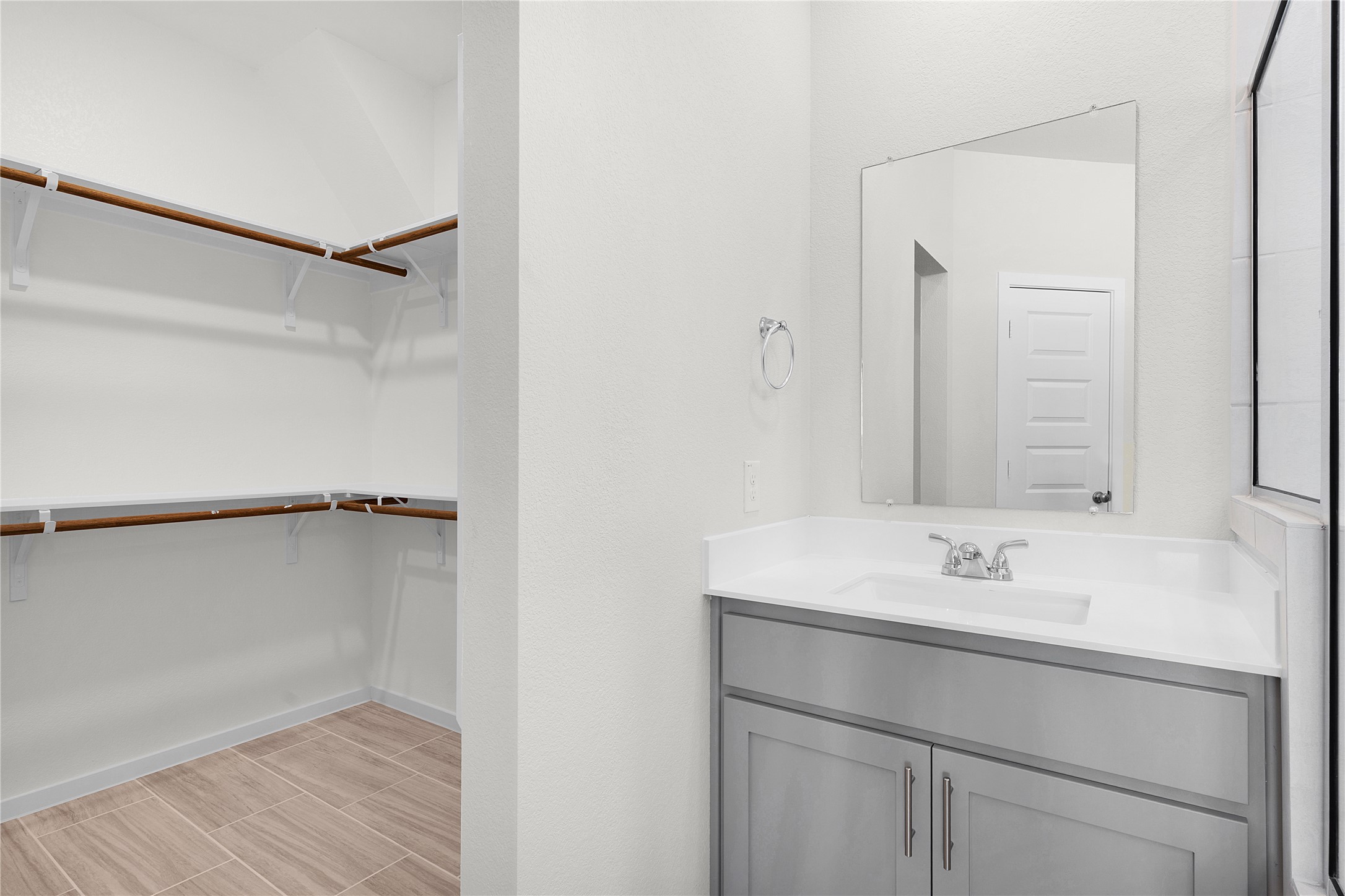 205 Blue Vervain Trail Georgetown, TX 78633 - Photo 12 of 27 a bathroom with a sink and a mirror