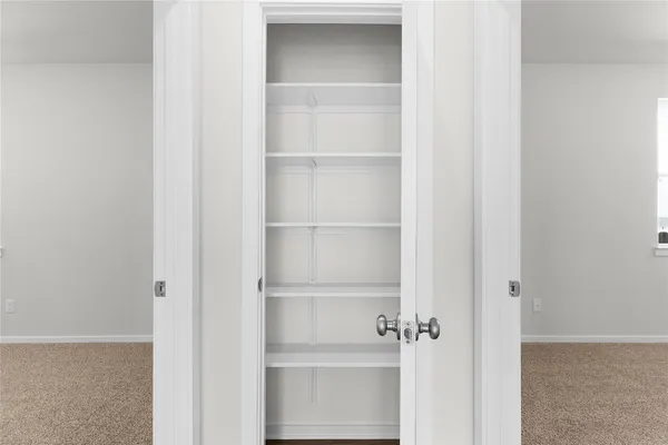 a bathroom with a shower sink vanity and mirror