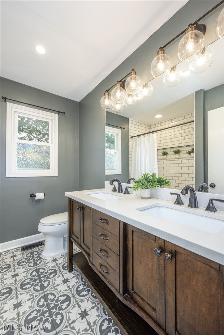 496 East Howe Road Kent, OH 44240 - Photo 14 of 38 Beautifully updated, double vanity, large tiled shower.