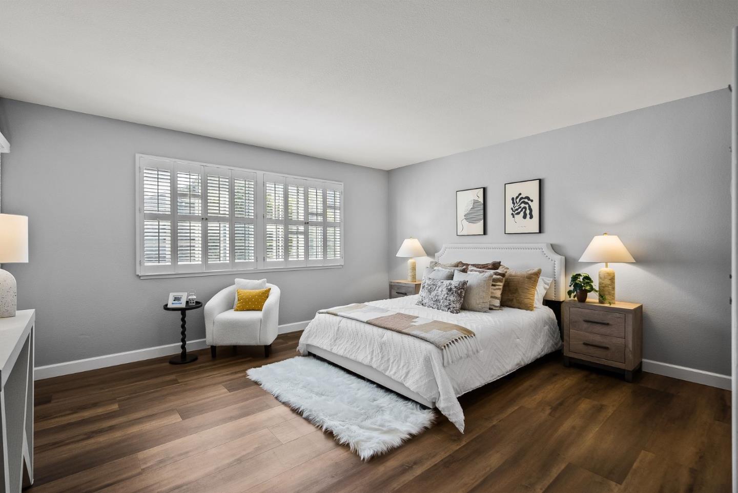 300 Troon Way Half Moon Bay, CA 94019 - Photo 19 of 50 a bedroom with a bed and a couch