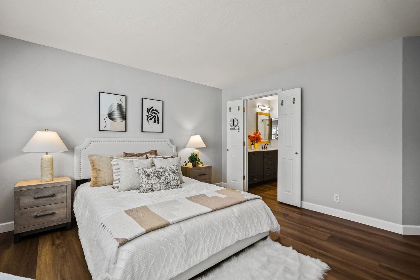 300 Troon Way Half Moon Bay, CA 94019 - Photo 20 of 50 a bedroom with a bed and a lamp