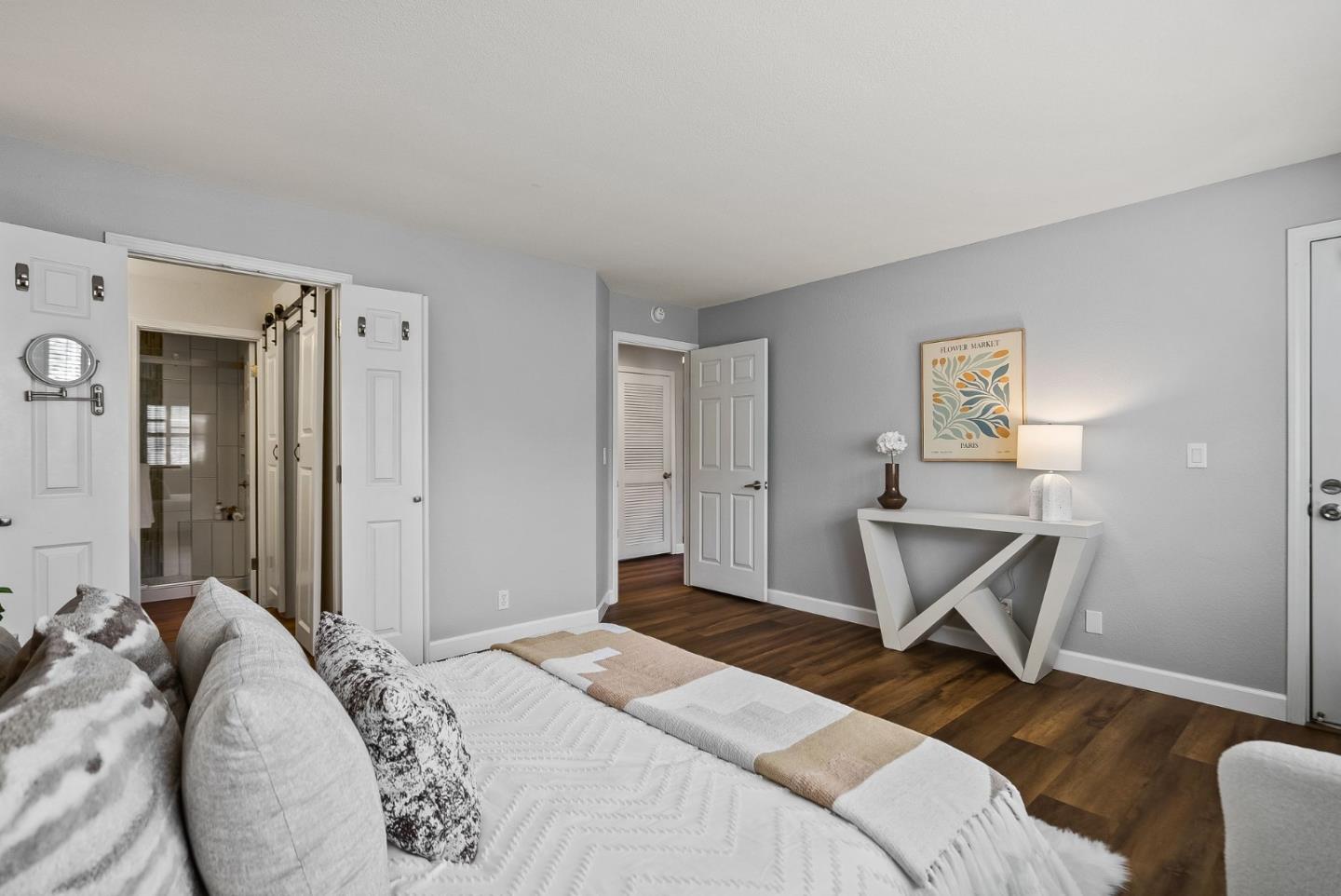 300 Troon Way Half Moon Bay, CA 94019 - Photo 21 of 50 a bedroom with a bed and a chair