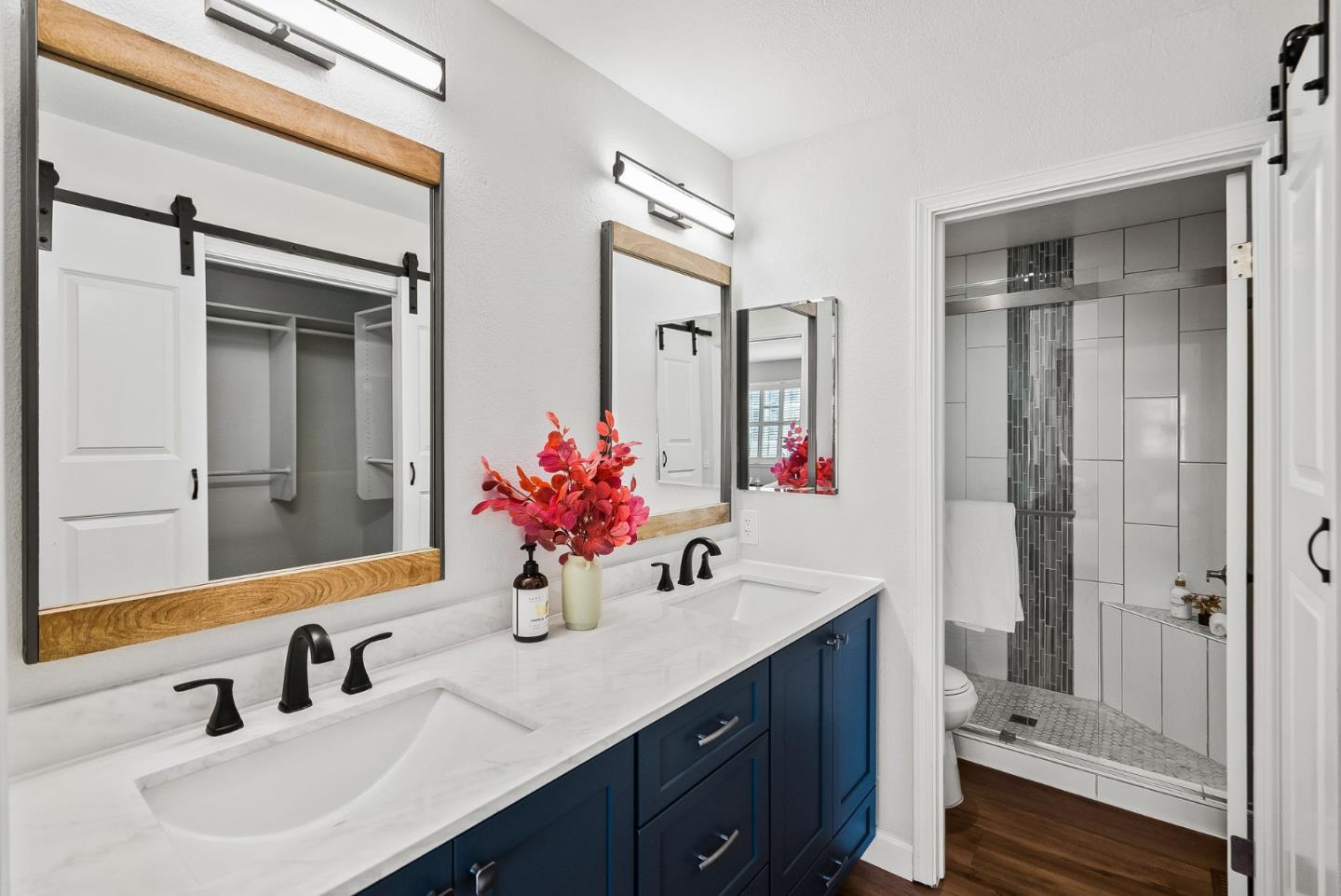 300 Troon Way Half Moon Bay, CA 94019 - Photo 22 of 50 a bathroom with a double vanity sink mirror and shower