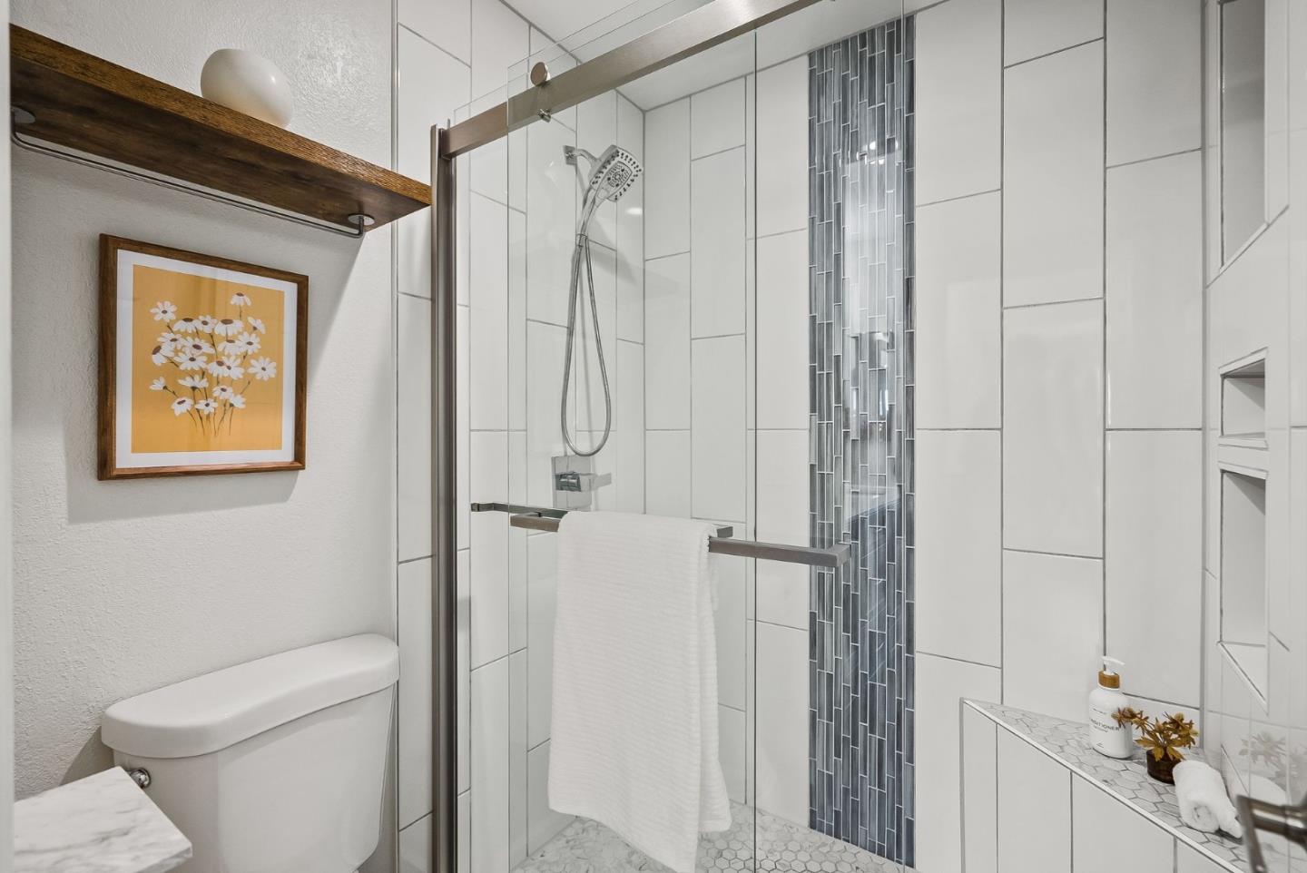 300 Troon Way Half Moon Bay, CA 94019 - Photo 23 of 50 a bathroom with a shower a toilet and a shower