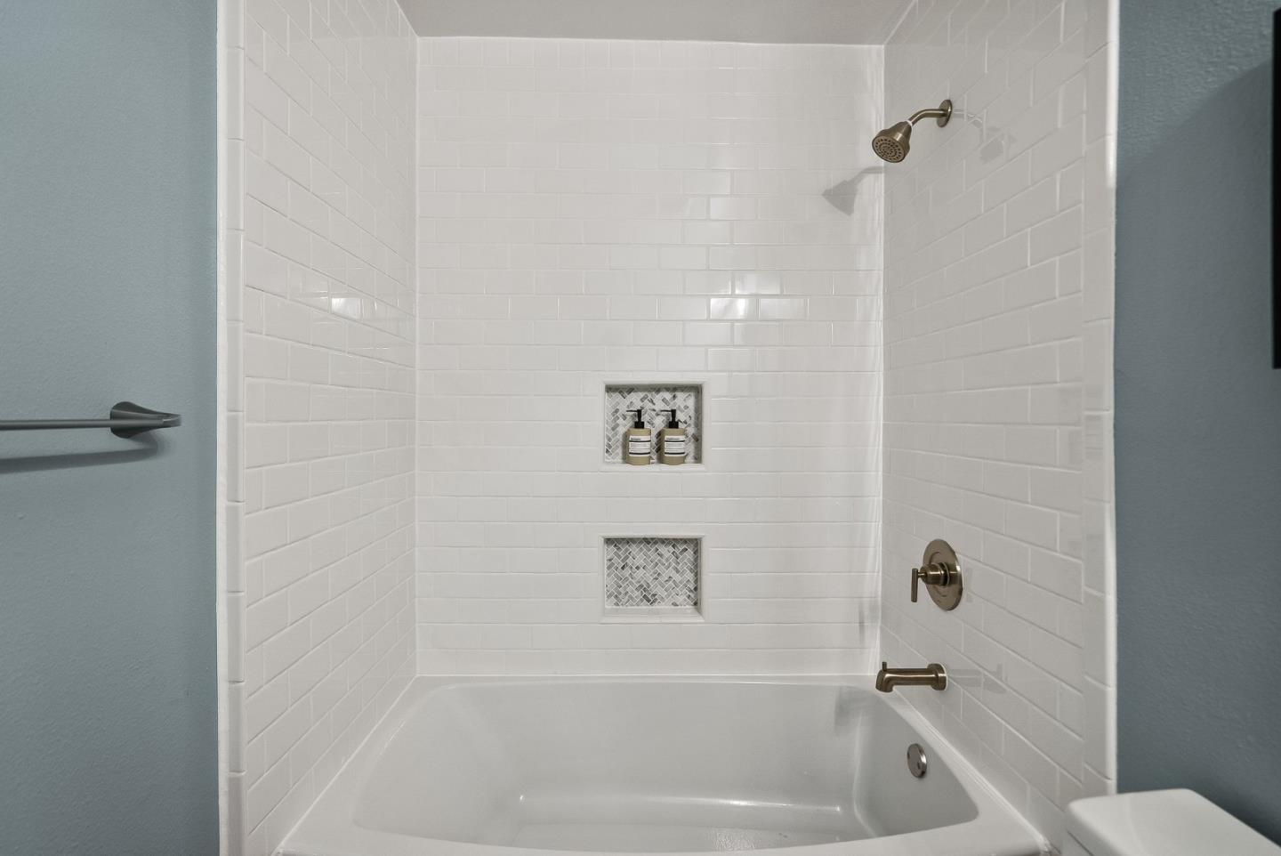 300 Troon Way Half Moon Bay, CA 94019 - Photo 31 of 50 a bathroom with a bathtub