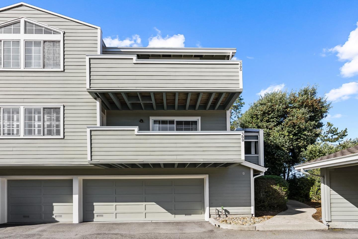 300 Troon Way Half Moon Bay, CA 94019 - Photo 35 of 50 a front view of a house with garage