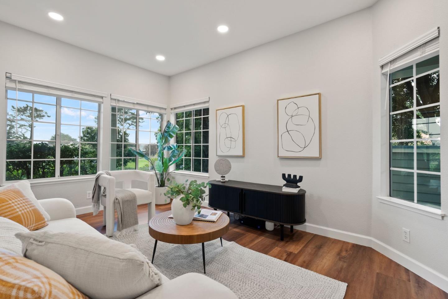 300 Troon Way Half Moon Bay, CA 94019 - Photo 5 of 50 a living room with furniture and a potted plant
