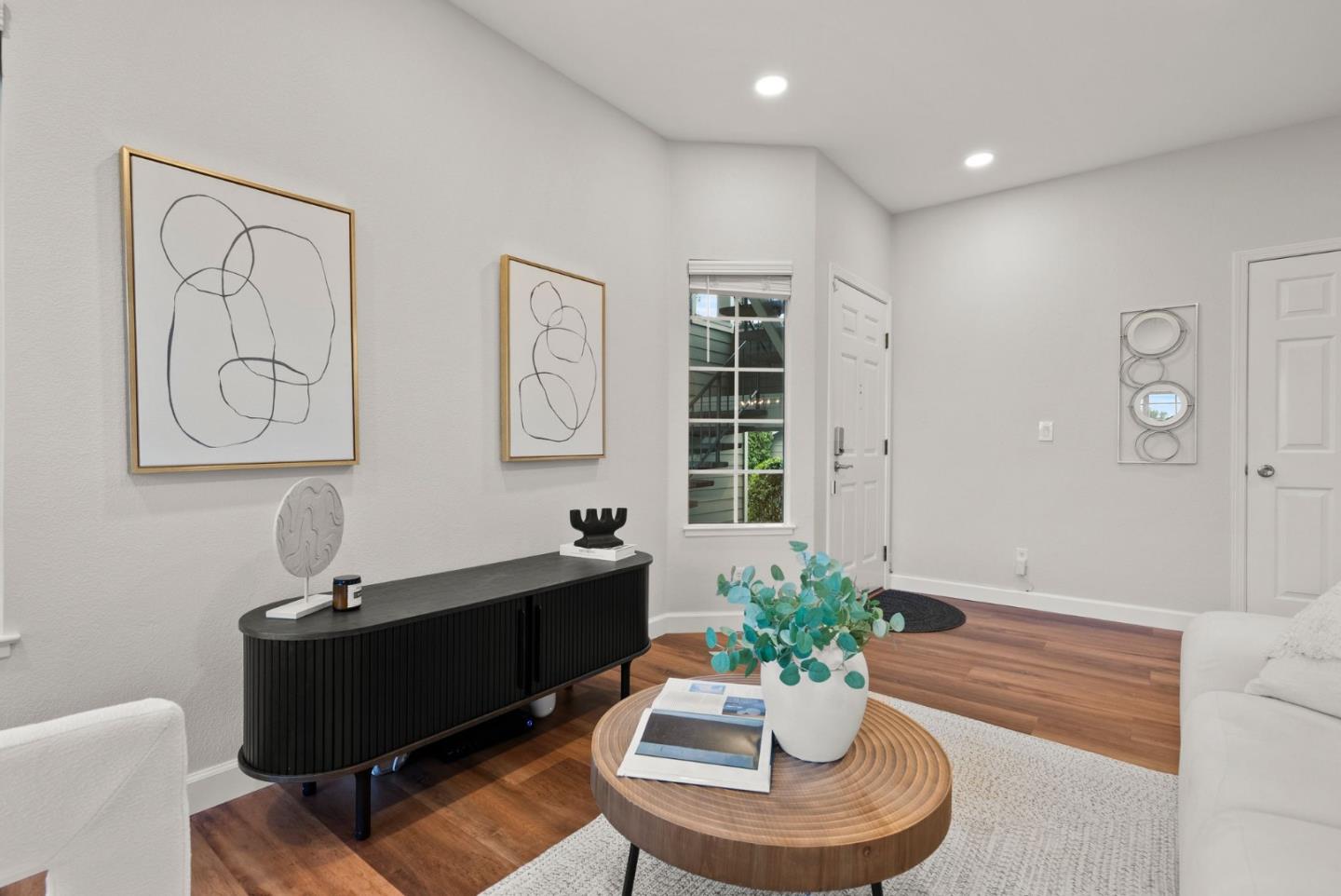 300 Troon Way Half Moon Bay, CA 94019 - Photo 6 of 50 a living room with furniture potted plant and a window