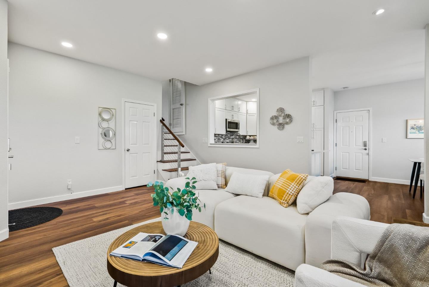 300 Troon Way Half Moon Bay, CA 94019 - Photo 7 of 50 a living room with furniture and a potted plant