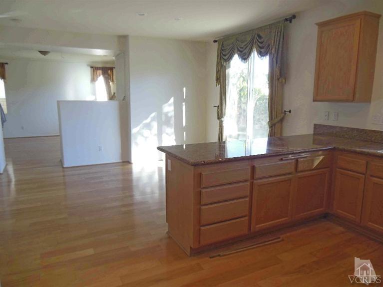 1146 Azalea Way Simi Valley, CA 93065 - Photo 13 of 22 a kitchen with sink and cabinets