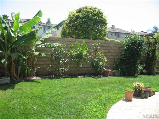 1146 Azalea Way Simi Valley, CA 93065 - Photo 3 of 22 a view of a garden with a fountain