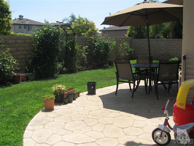 1146 Azalea Way Simi Valley, CA 93065 - Photo 21 of 22 a view of a backyard with sitting area and furniture