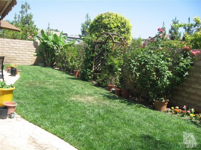 1146 Azalea Way Simi Valley, CA 93065 - Photo 22 of 22 a view of a backyard with potted plants