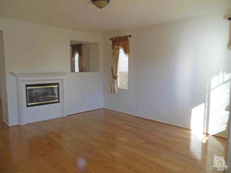 1146 Azalea Way Simi Valley, CA 93065 - Photo 8 of 22 an empty room with windows and cabinet