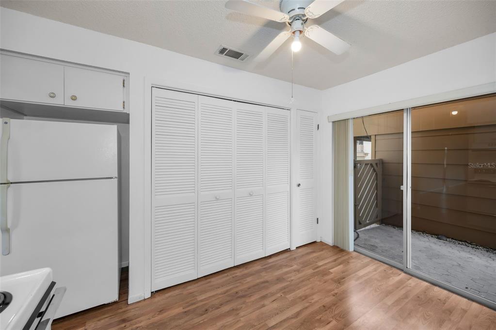 4014 Davit Drive, Unit A New Port Richey, FL 34652 - Photo 19 of 49 a view of empty room with wooden floor and closet