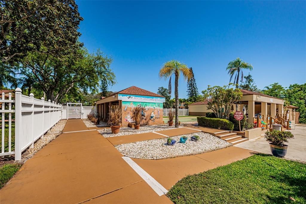 4014 Davit Drive, Unit A New Port Richey, FL 34652 - Photo 37 of 49 a view of a swimming pool with a patio