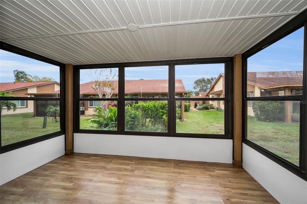 4014 Davit Drive, Unit A New Port Richey, FL 34652 - Photo 8 of 49 a view of lot of big room with a large window
