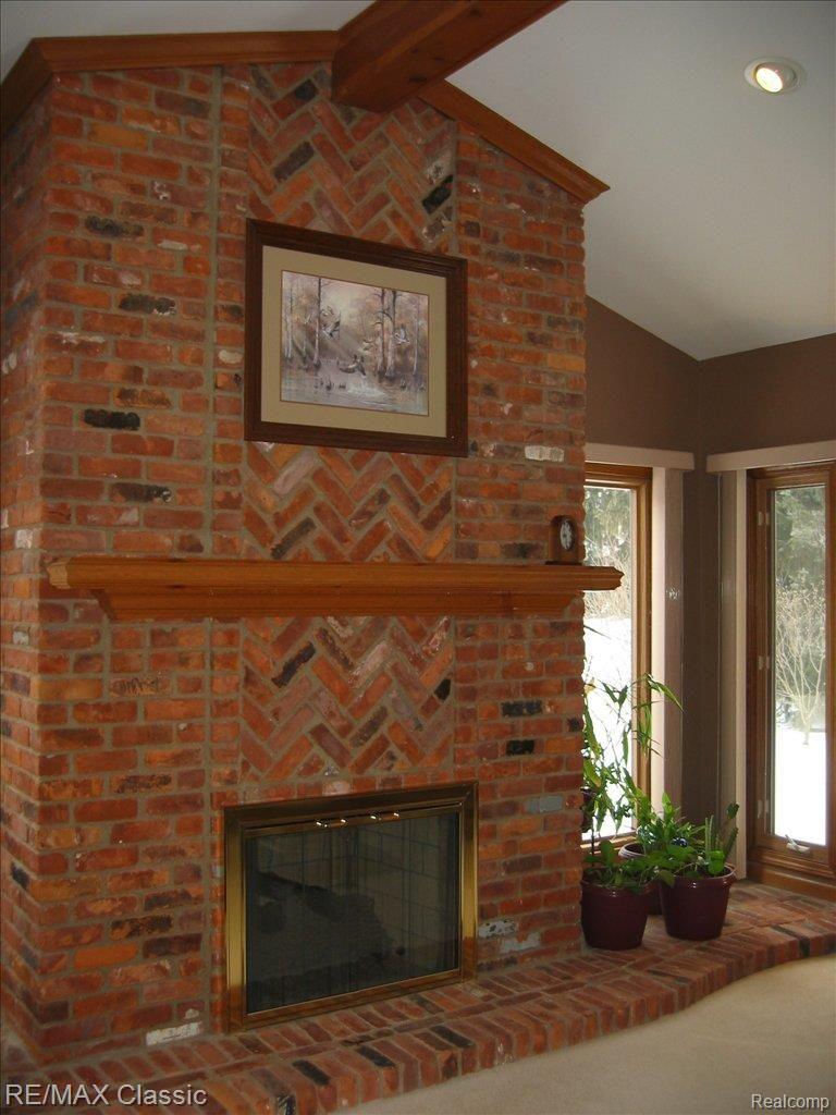 6187 Country Ridge Drive Troy, MI 48098 - Photo 7 of 17 Cozy Fireplace
