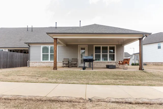 a house view with a outdoor space