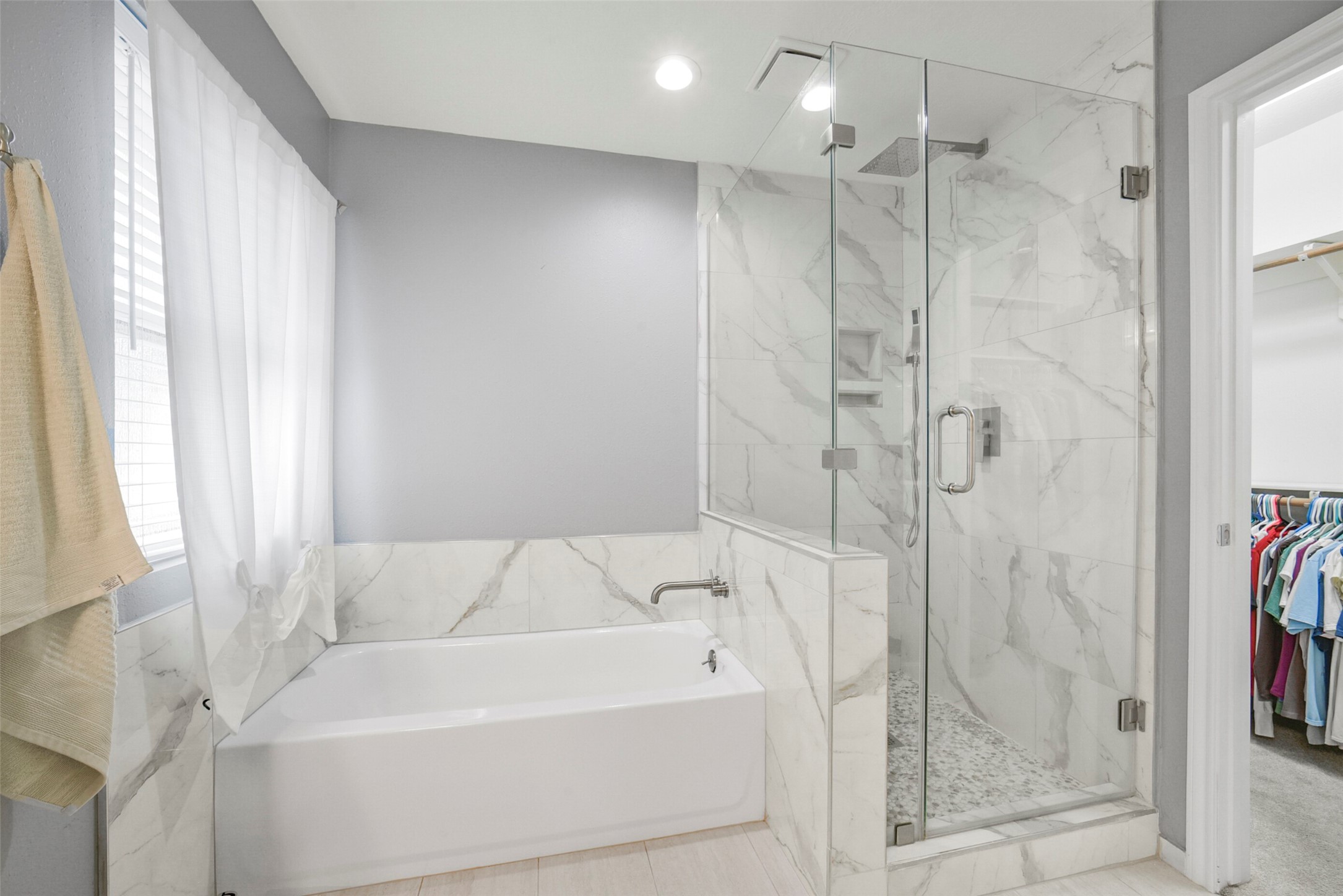 38 Tallow Hill Place Spring, TX 77382 - Photo 24 of 50 a bathroom with a bathtub and a shower