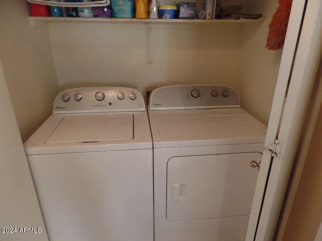 1873 West Renaissance Avenue Apache Junction, AZ 85120 - Photo 13 of 18 a utility room with dryer and washer