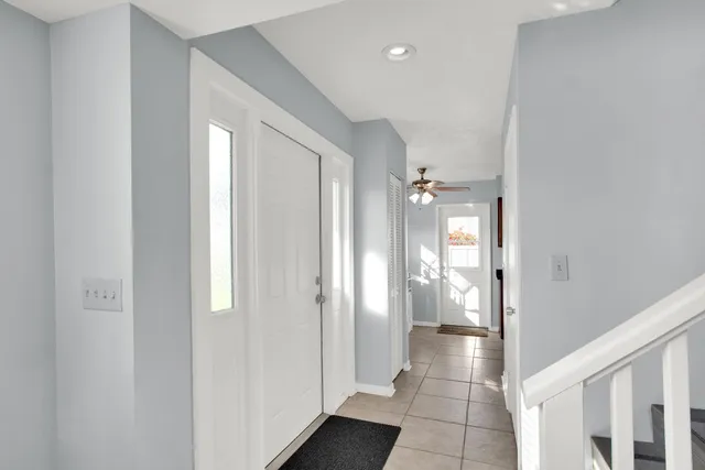 a spacious bathroom with a glass door shower