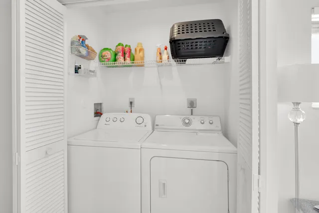 a utility room with dryer and washer