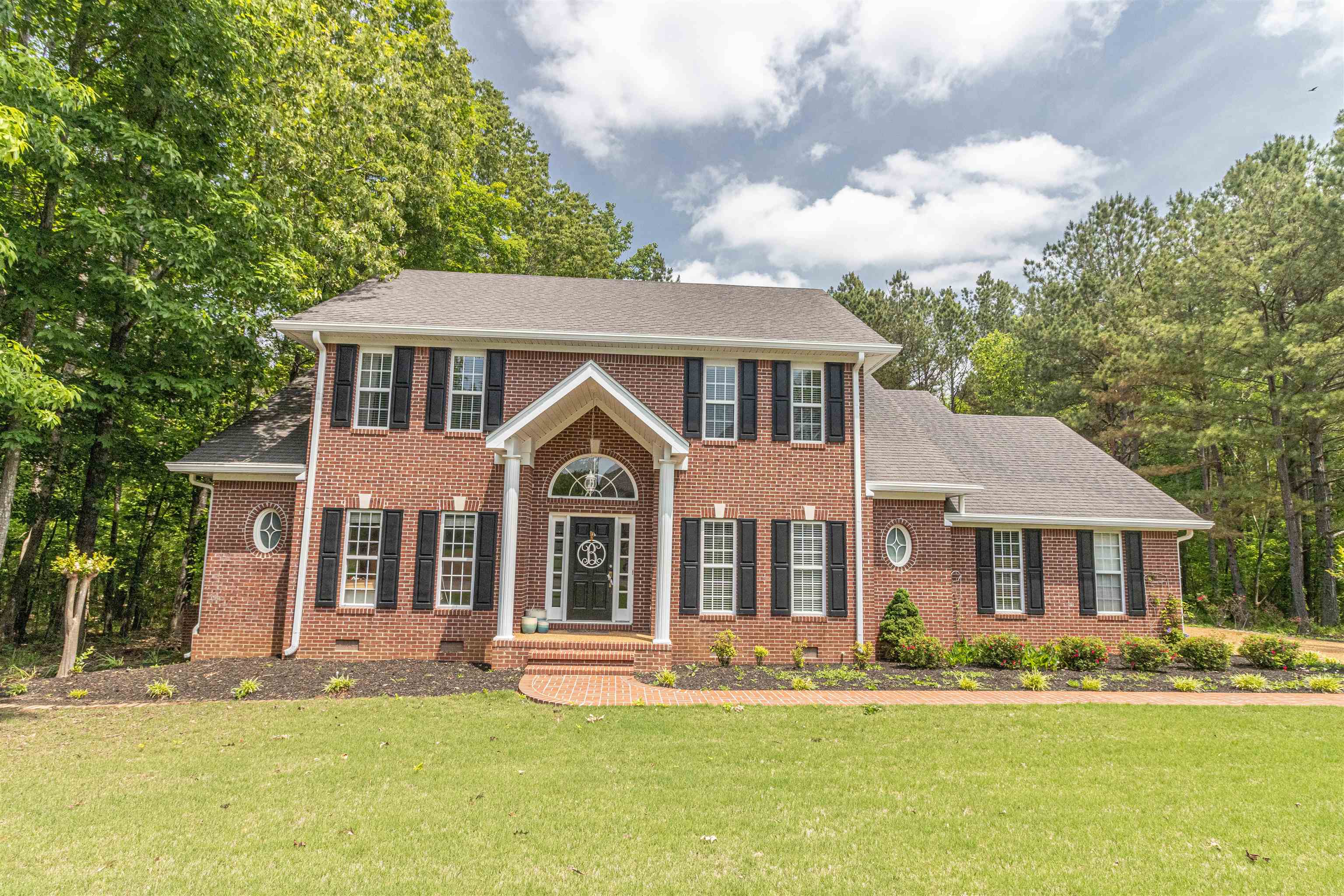 3501 Blue Bird Lane Corinth, MS 38834 - Photo 1 of 25 front view of a house with a yard