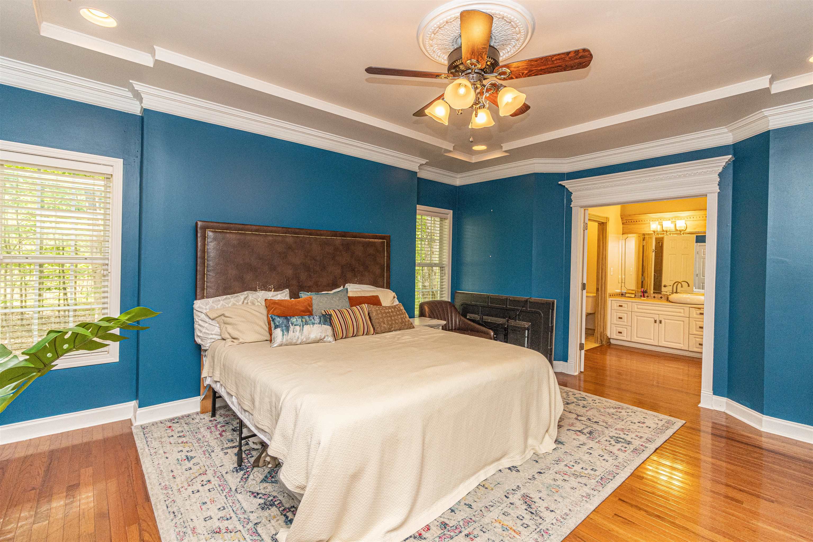 3501 Blue Bird Lane Corinth, MS 38834 - Photo 12 of 25 a bedroom with a bed ceiling fan and a window