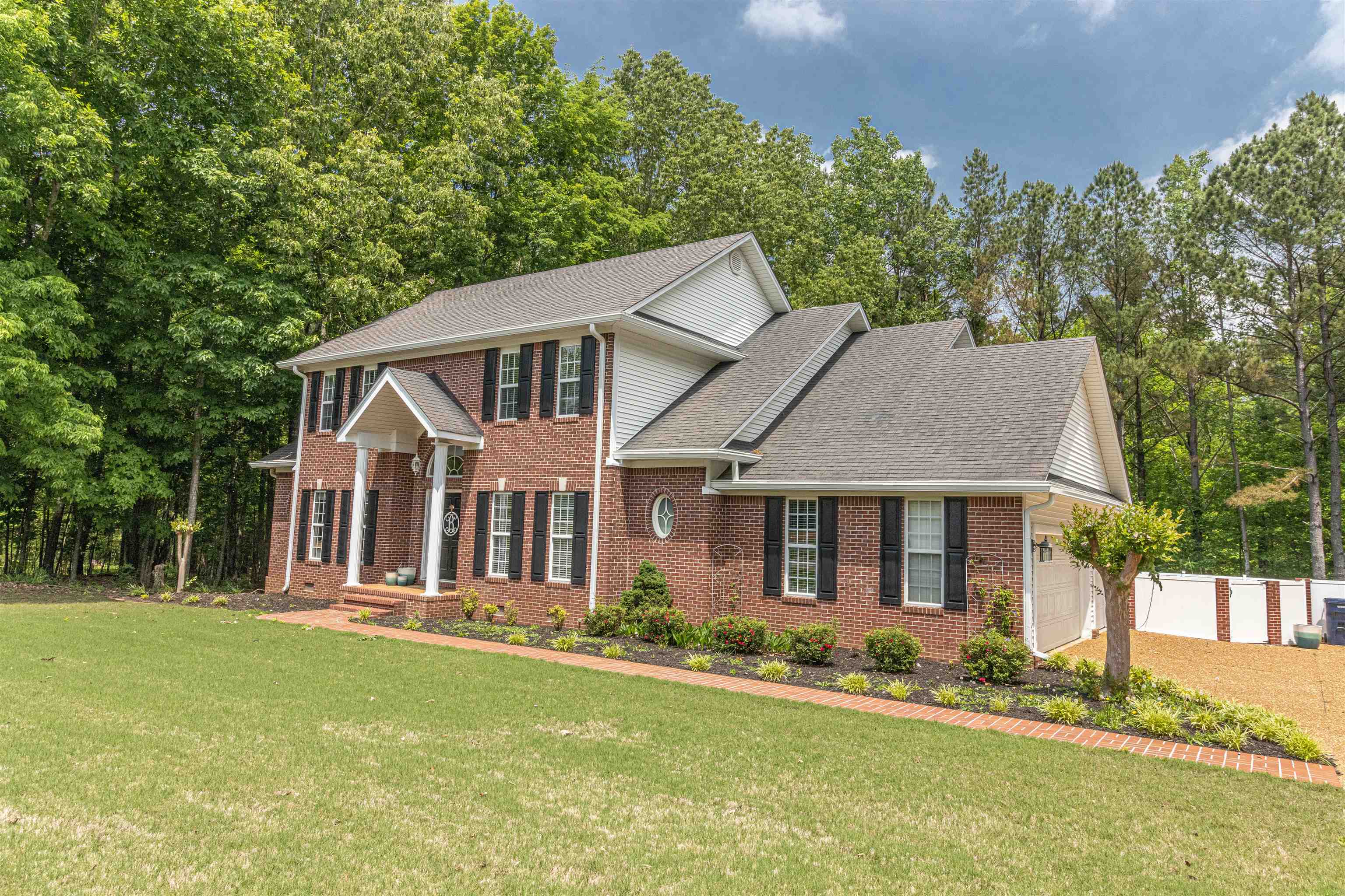 3501 Blue Bird Lane Corinth, MS 38834 - Photo 2 of 25 front view of a house with a yard