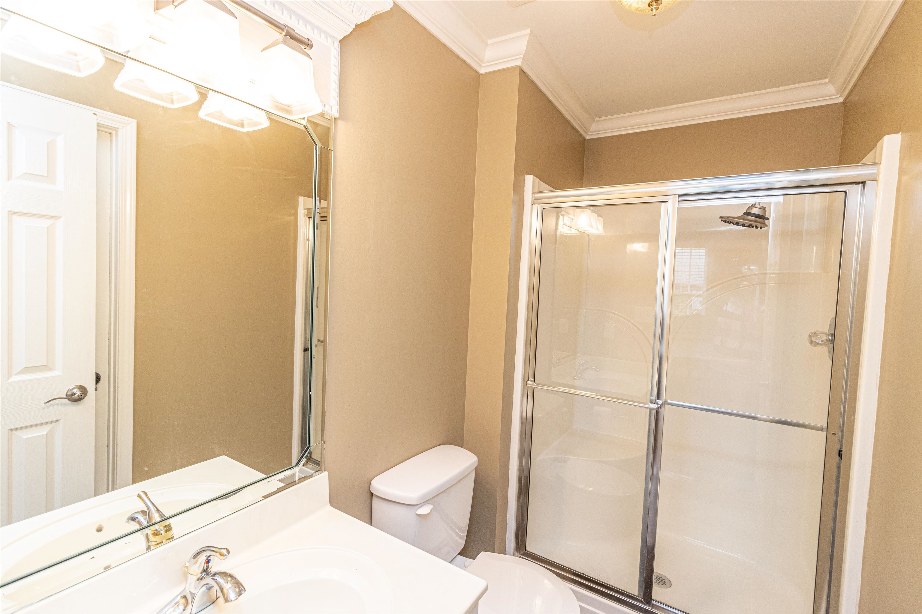3501 Blue Bird Lane Corinth, MS 38834 - Photo 22 of 25 a bathroom with a shower and a toilet