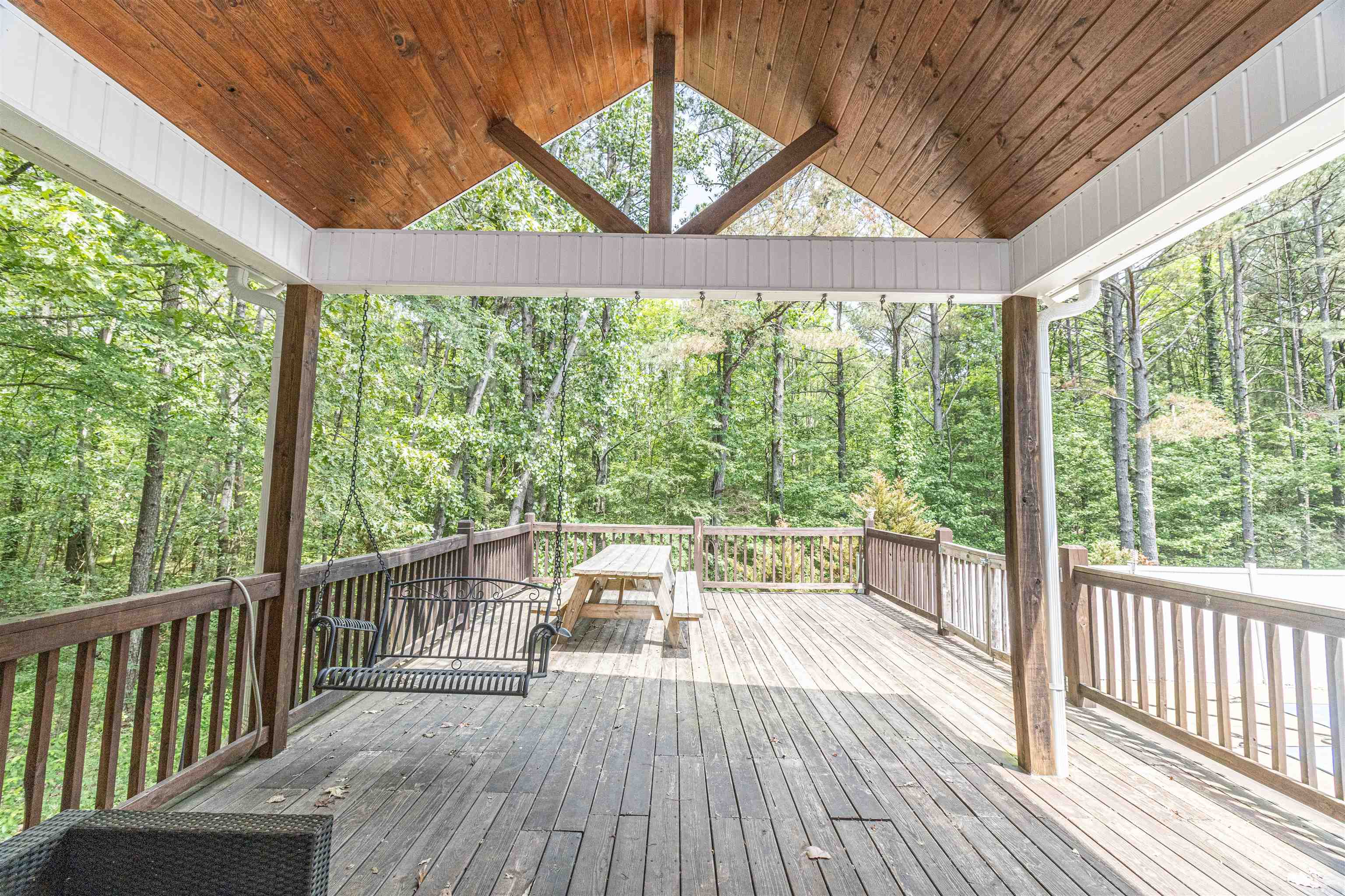 3501 Blue Bird Lane Corinth, MS 38834 - Photo 23 of 25 a view of balcony with couch and wooden floor