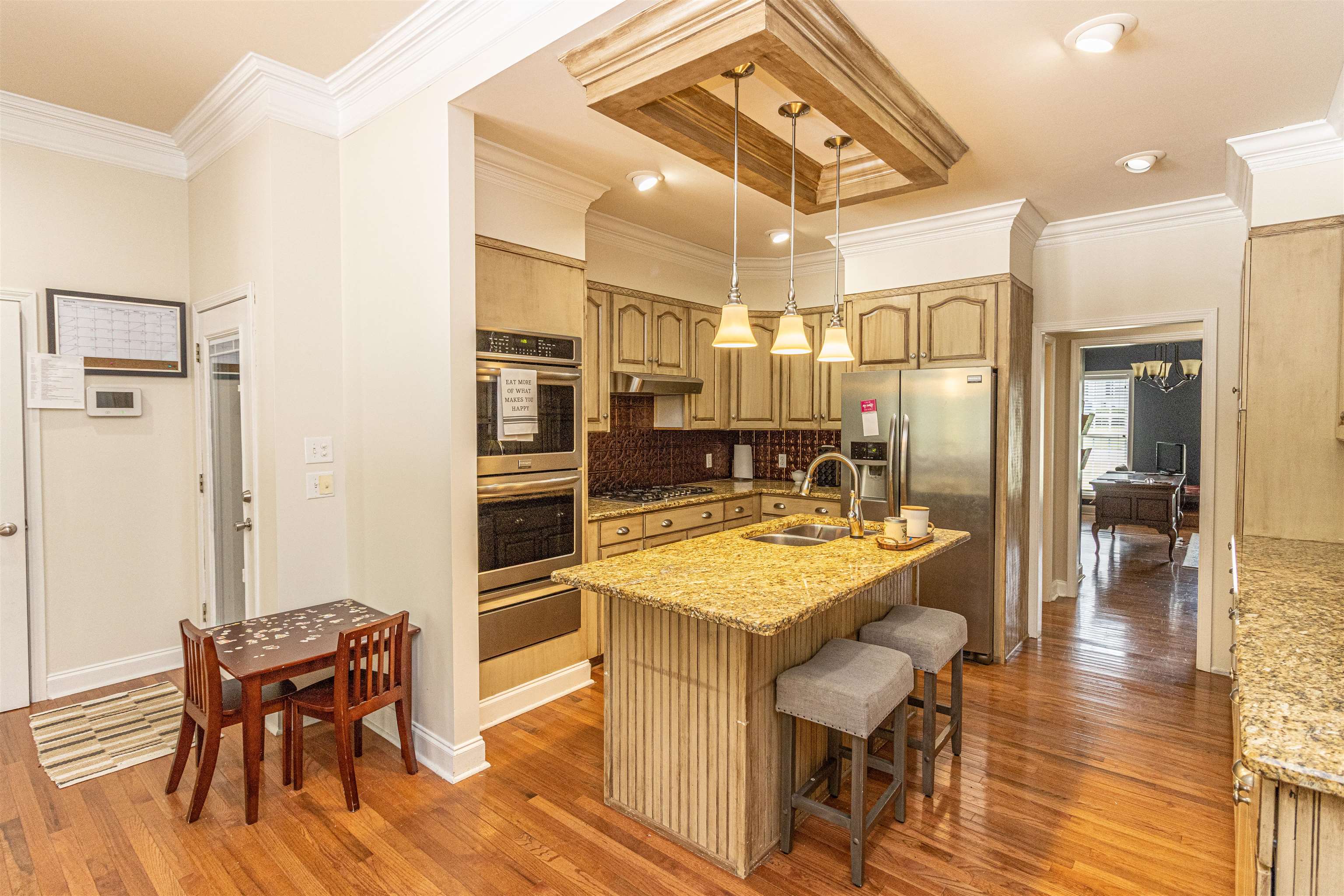 3501 Blue Bird Lane Corinth, MS 38834 - Photo 5 of 25 a large kitchen with a table and chairs