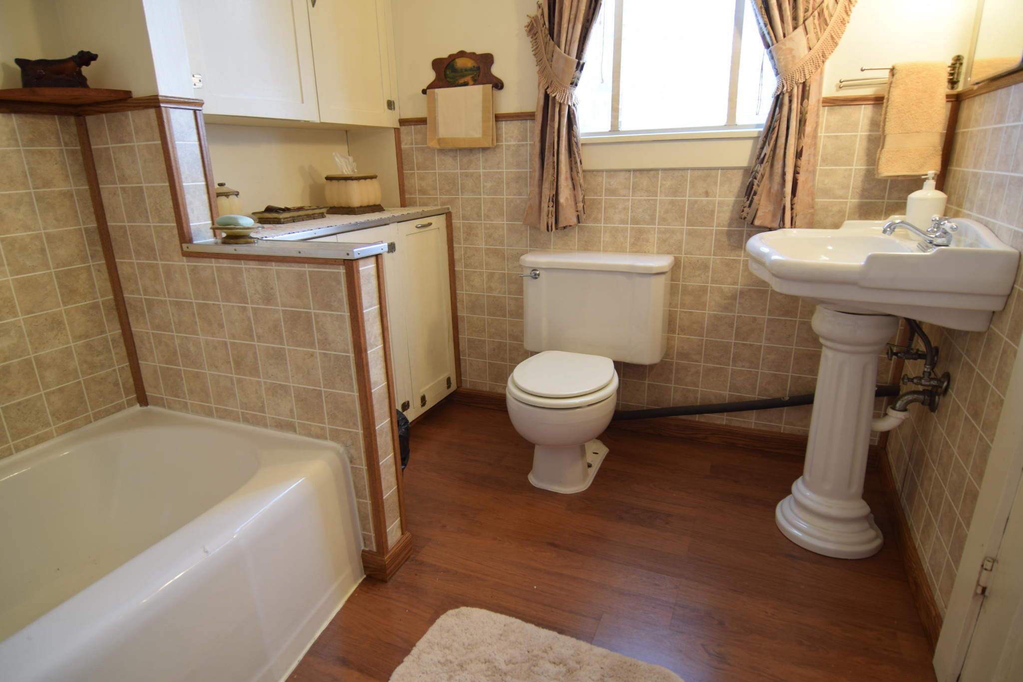 2338 Bear Creek Road Oneida, TN 37841 - Photo 20 of 40 a bathroom with a sink toilet and shower