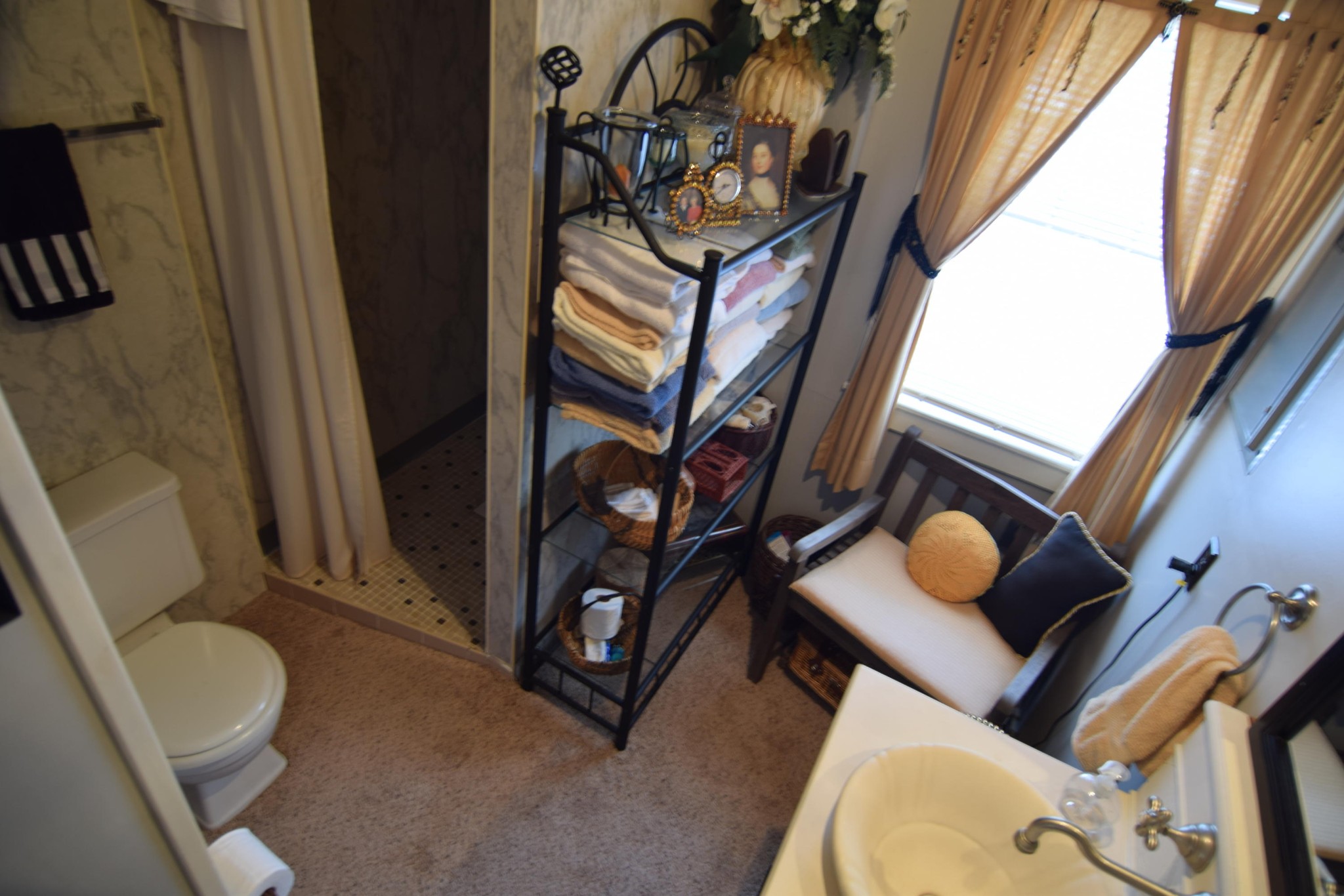 2338 Bear Creek Road Oneida, TN 37841 - Photo 21 of 40 a bathroom with a toilet sink and mirror