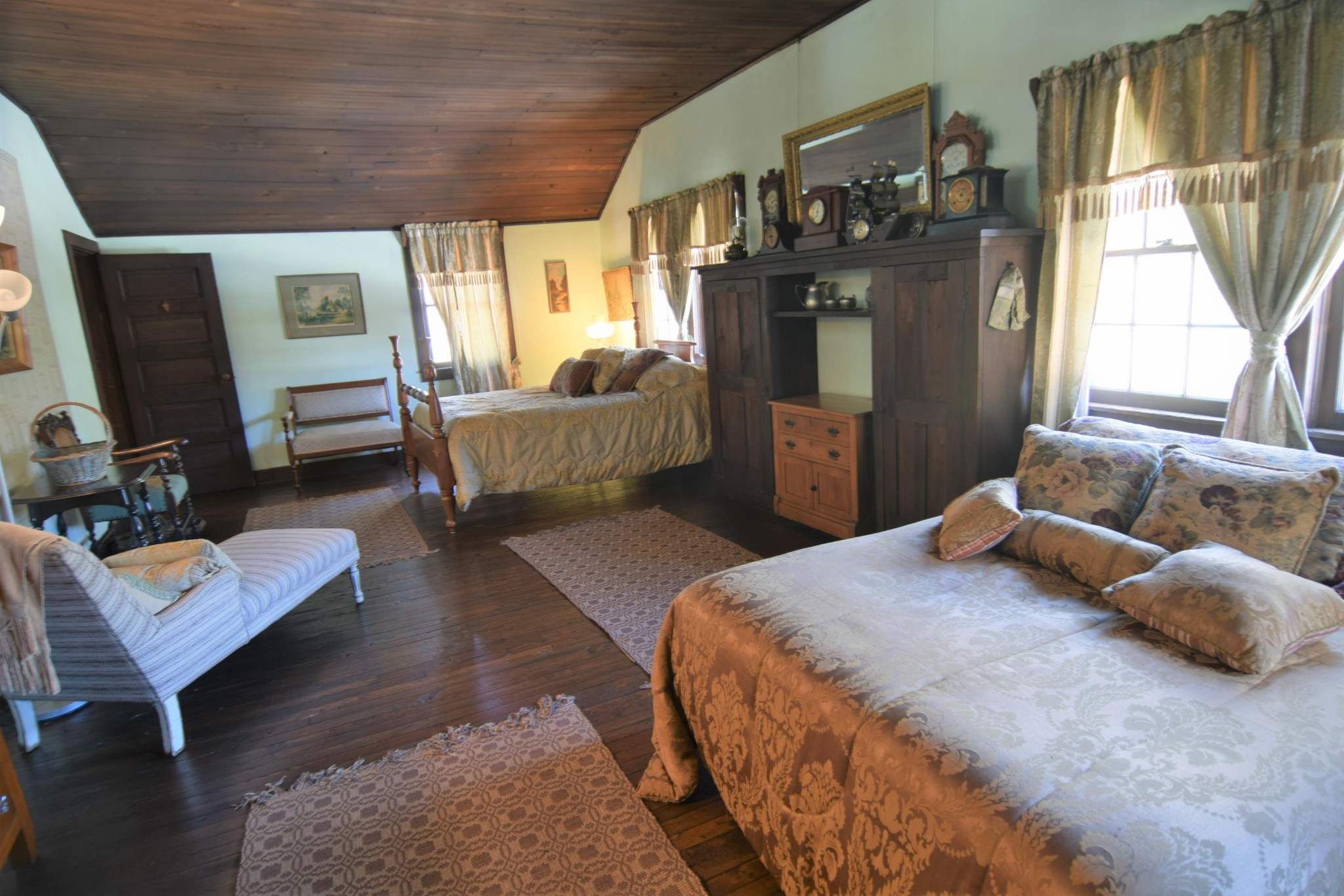 2338 Bear Creek Road Oneida, TN 37841 - Photo 23 of 40 a bedroom with a bed couch and window