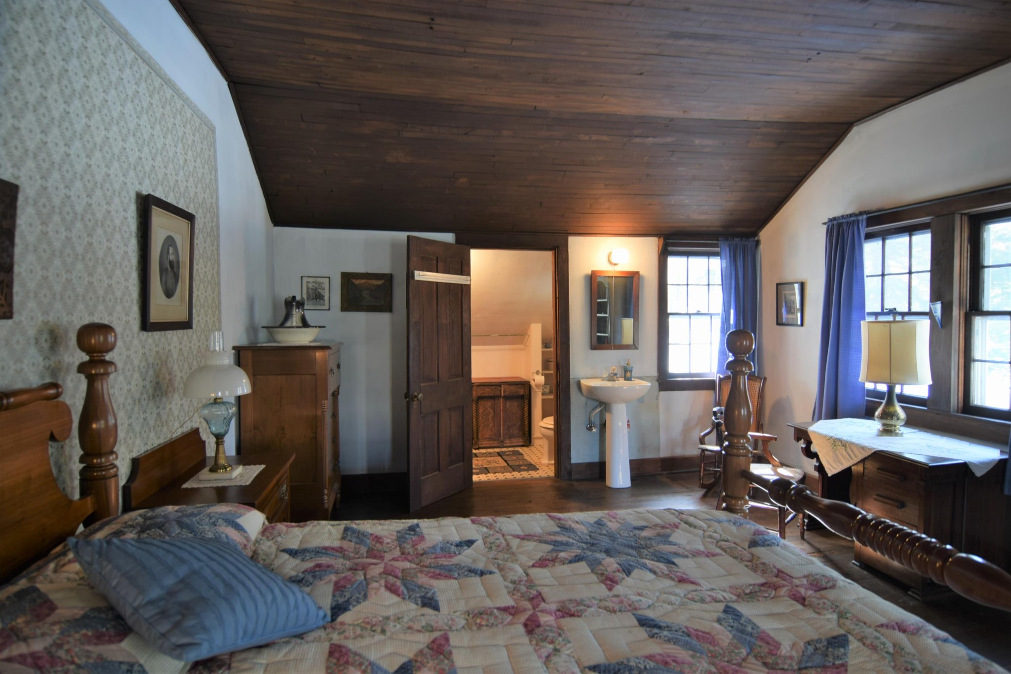 2338 Bear Creek Road Oneida, TN 37841 - Photo 25 of 40 a bedroom with furniture and large windows