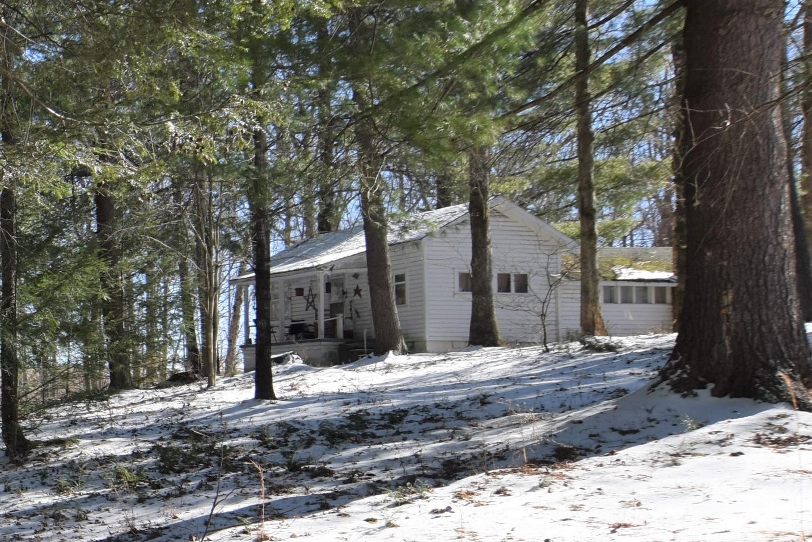 2338 Bear Creek Road Oneida, TN 37841 - Photo 37 of 40 a view of a house with snow on the road