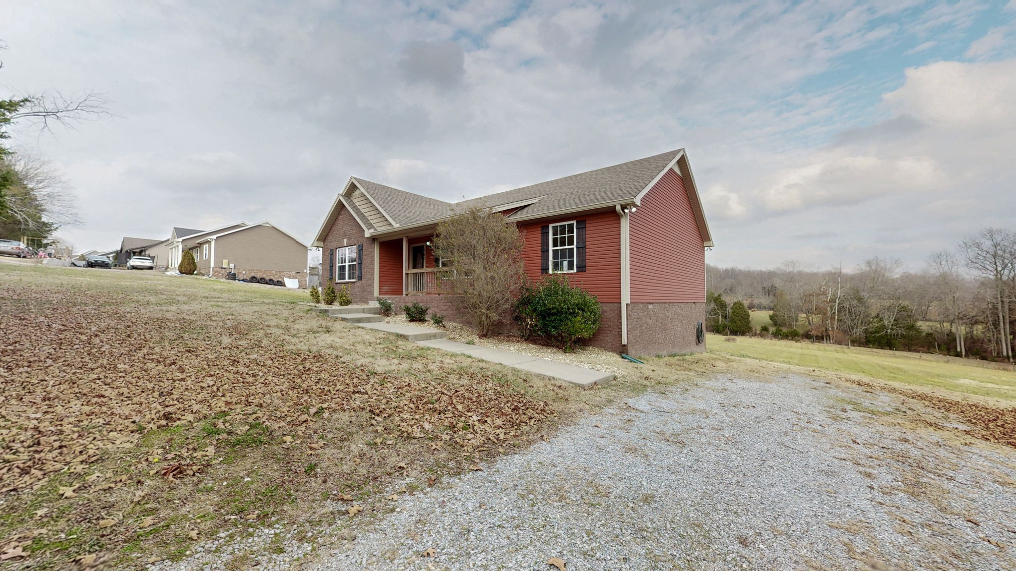 574 Keytown Road Portland, TN 37148 - Photo 2 of 45 a house view with a garden space