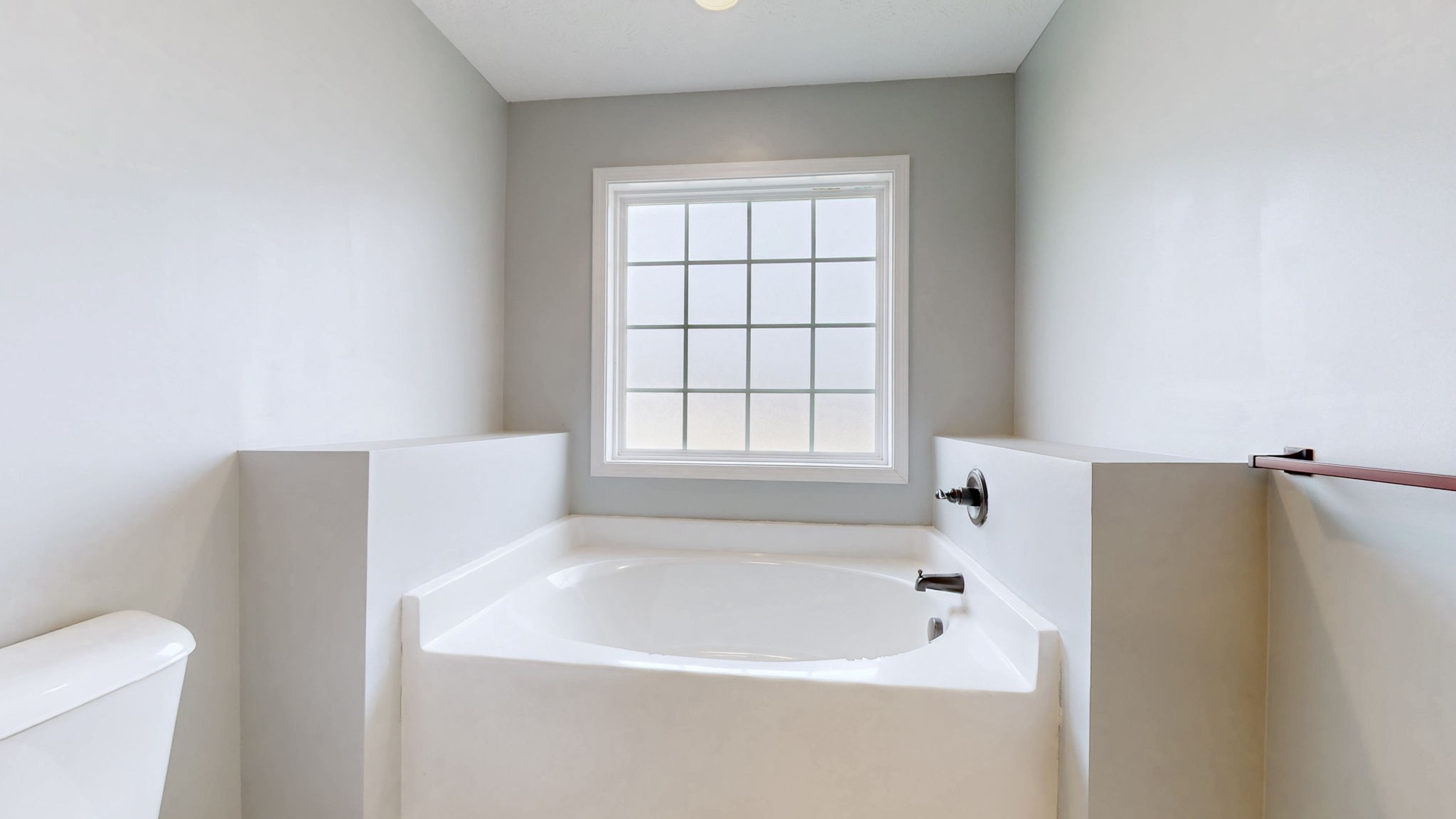 574 Keytown Road Portland, TN 37148 - Photo 23 of 45 a white bath tub sitting next to a toilet